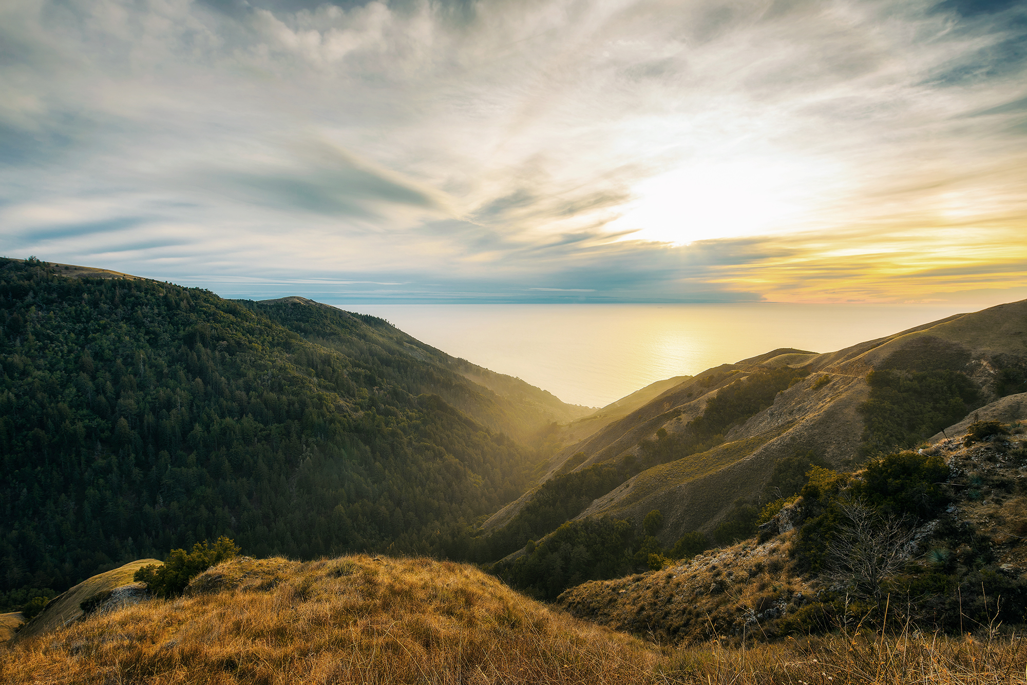 Sunset over the Pacific Ocean seen from the Nacimiento-Fergusson road through the Santa Lucia Range in California